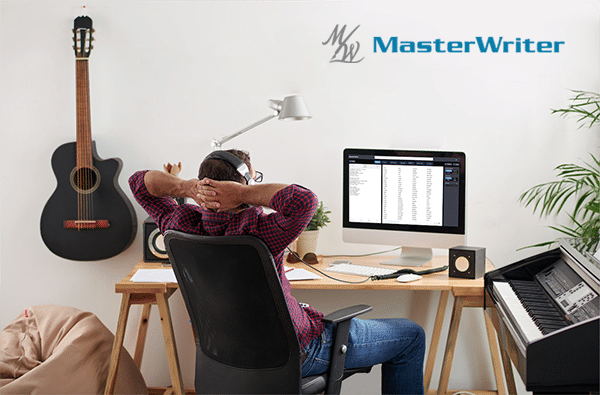 Songwriter sits at computer with MasterWriter
